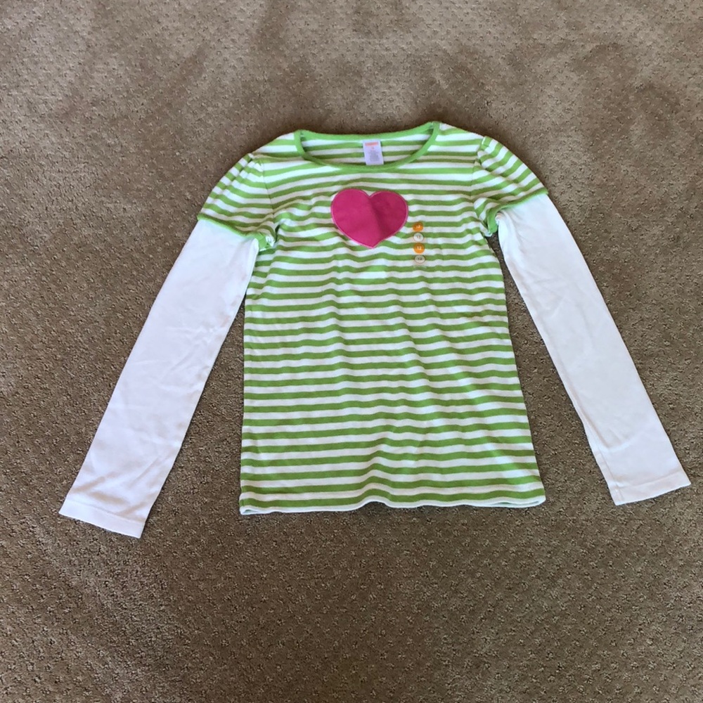 Green and white striped shirt.